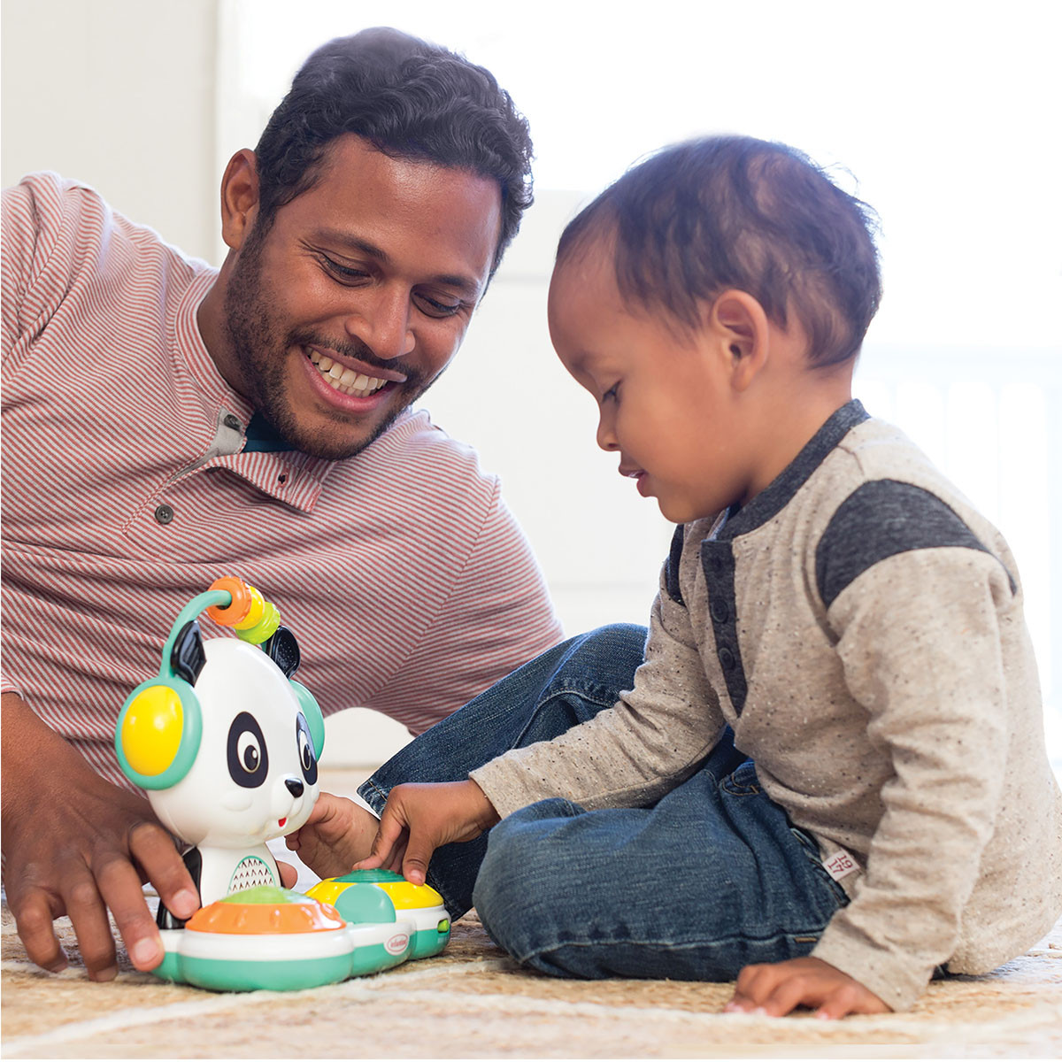 Infantino muzička/edikativna igračka Spin and slide Panda