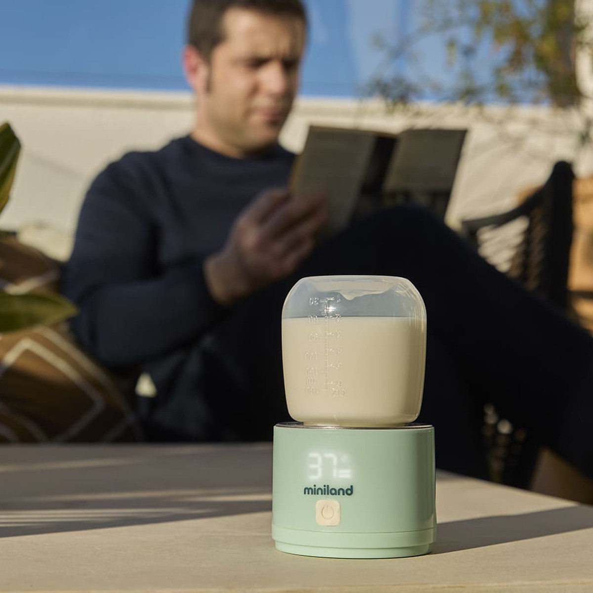 Miniland prenosivi grejač za flašice